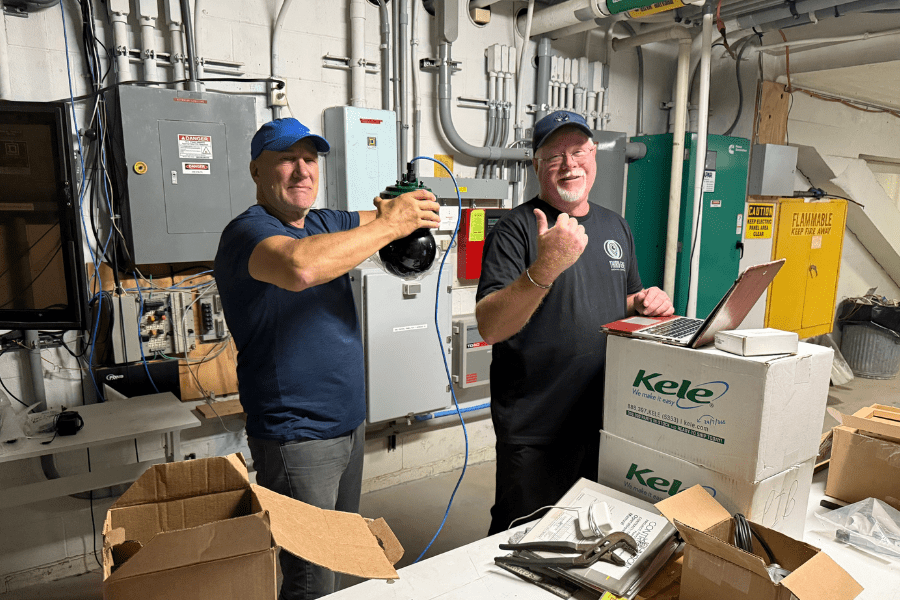 The team getting a camera ready to mount