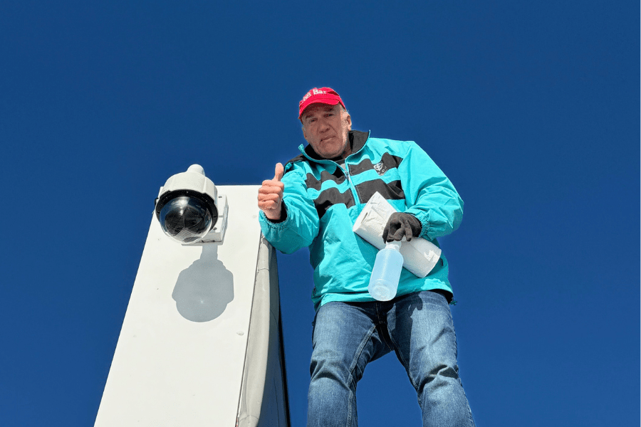 Giving a thumbs up after cleaning the Put-in-Bay Condos Cam