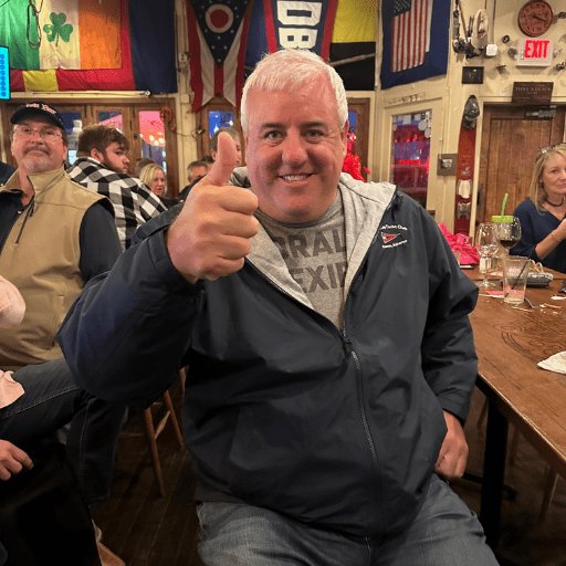1 Bryan Kasper giving a thumbs up at a Put-in-Bay bar,