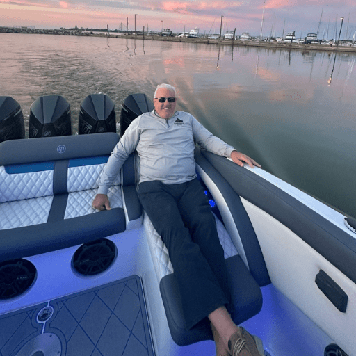 3 Bryan Kasper lounging on his boat.