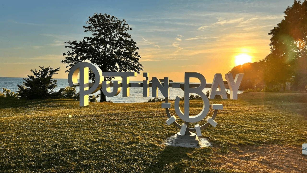 1 A shot of the Put-in-Bay Sign at sunset